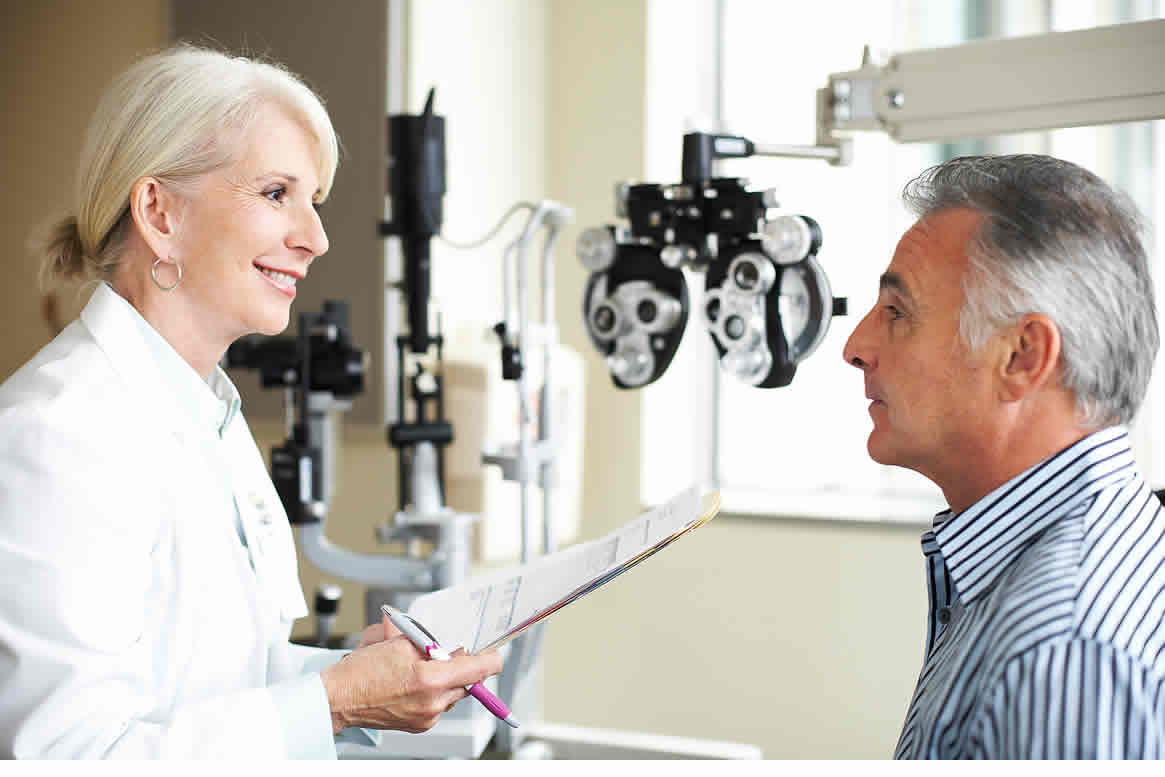 Eye doctor and patient